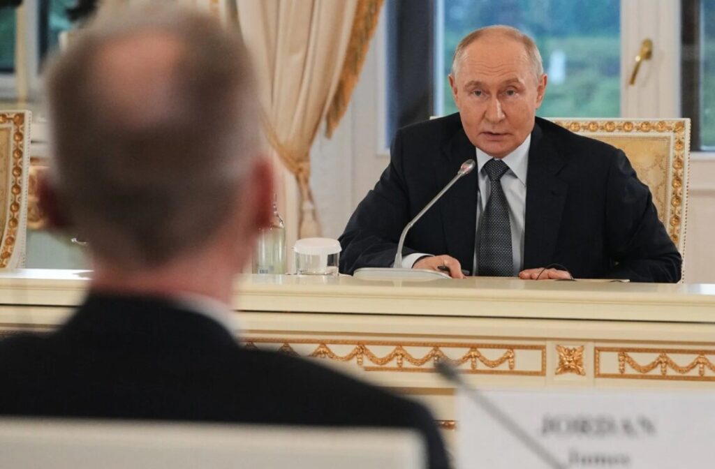 путін