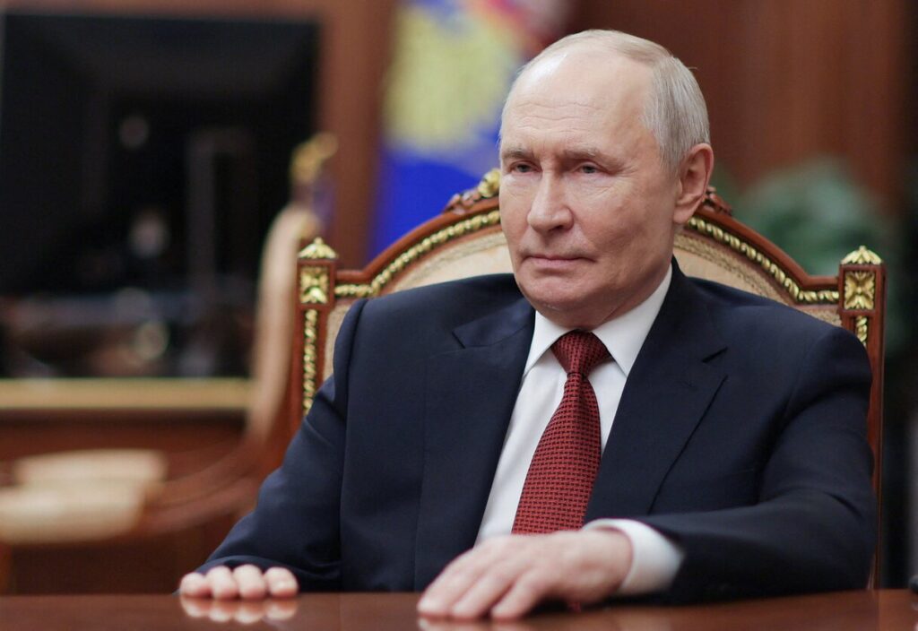 путін