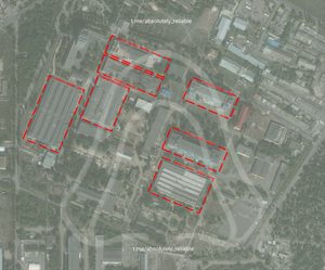 Супутникові знімки показали масштаб ураження Азовського оптико-механічного заводу Супутниковий знімок пошкоджених цехів Азовського оптико-механічного заводу після удару 26 вересня